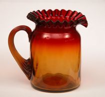 Appraisal: Amberina Creamer A very deep color of red at ruffled