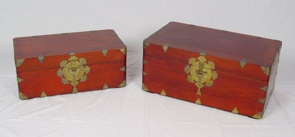 Appraisal: PAIR OF KOREAN CAMPAIGN STYLE CHESTS Brass mounted stackable chests