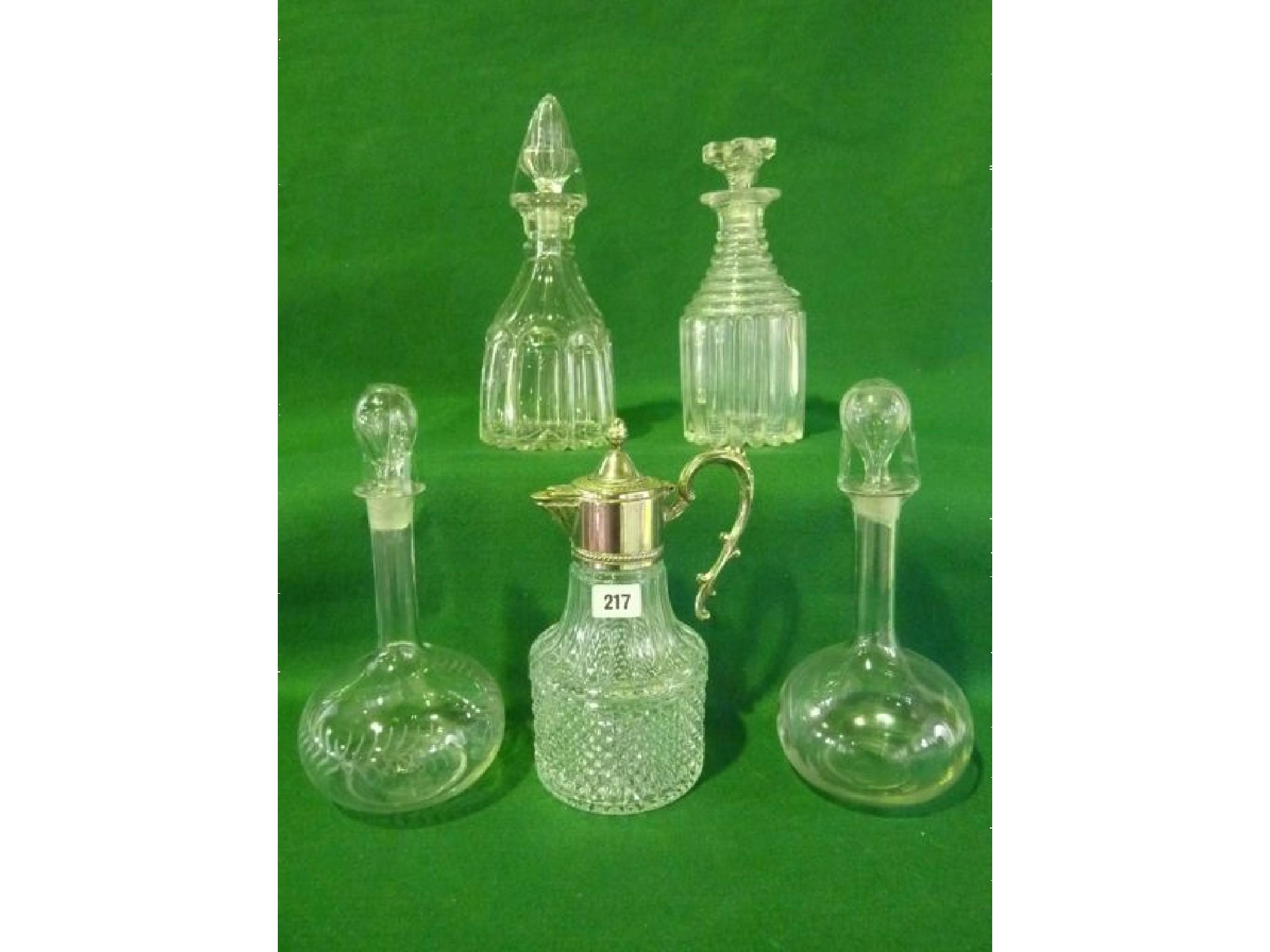 Appraisal: A large selection of th century and later glass decanters