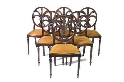 Appraisal: A set of six dining chairs each with ribbon-tied plume