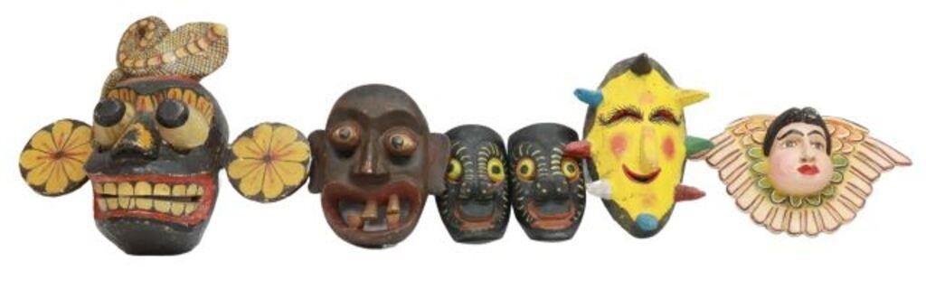 Appraisal: lot of Folk art dance masks and wall hangings Mexico