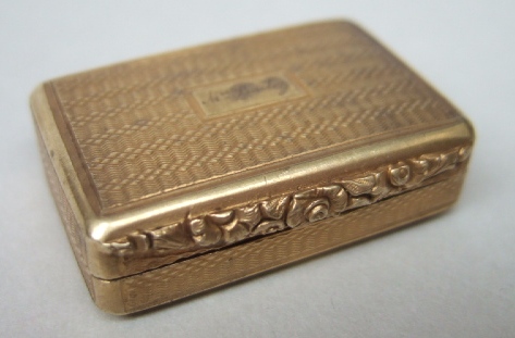 Appraisal: A rectangular silver gilt vinaigrette with a scroll pierced and