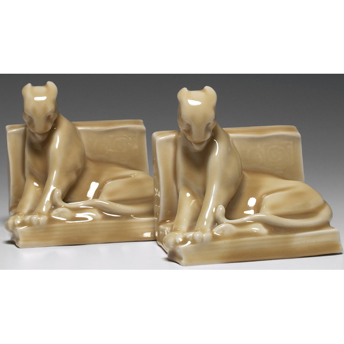 Appraisal: Rookwood bookends pair reclining panther covered in a tan Hi-glaze