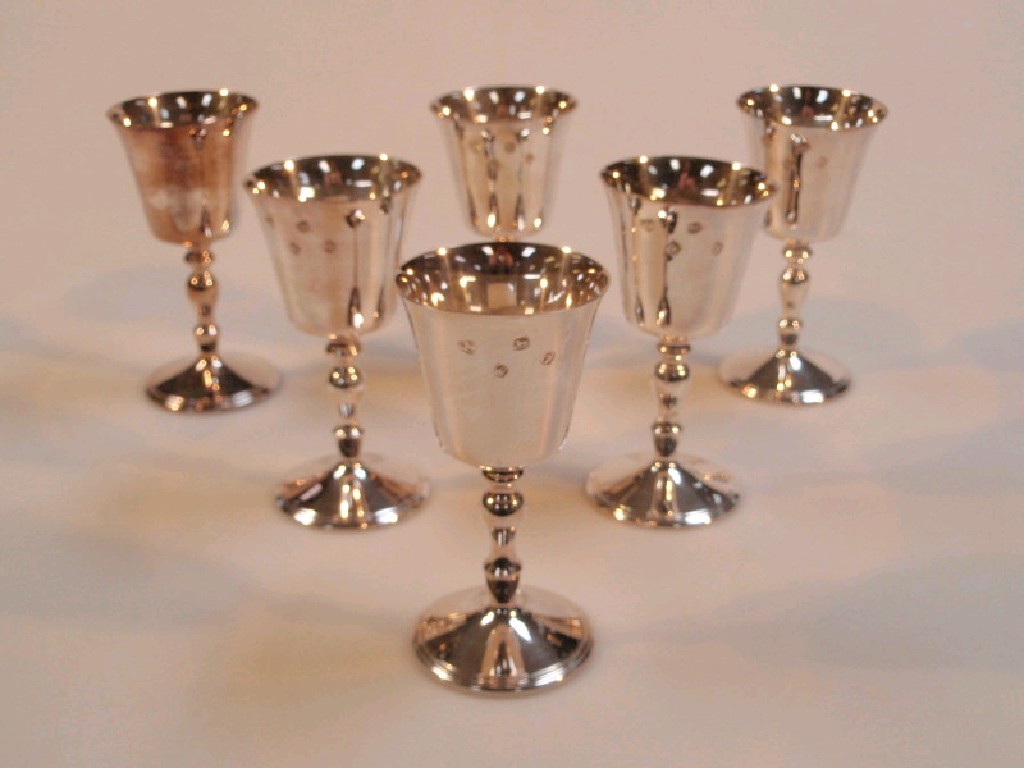 Appraisal: A set of six silver goblets with slightly everted bowls