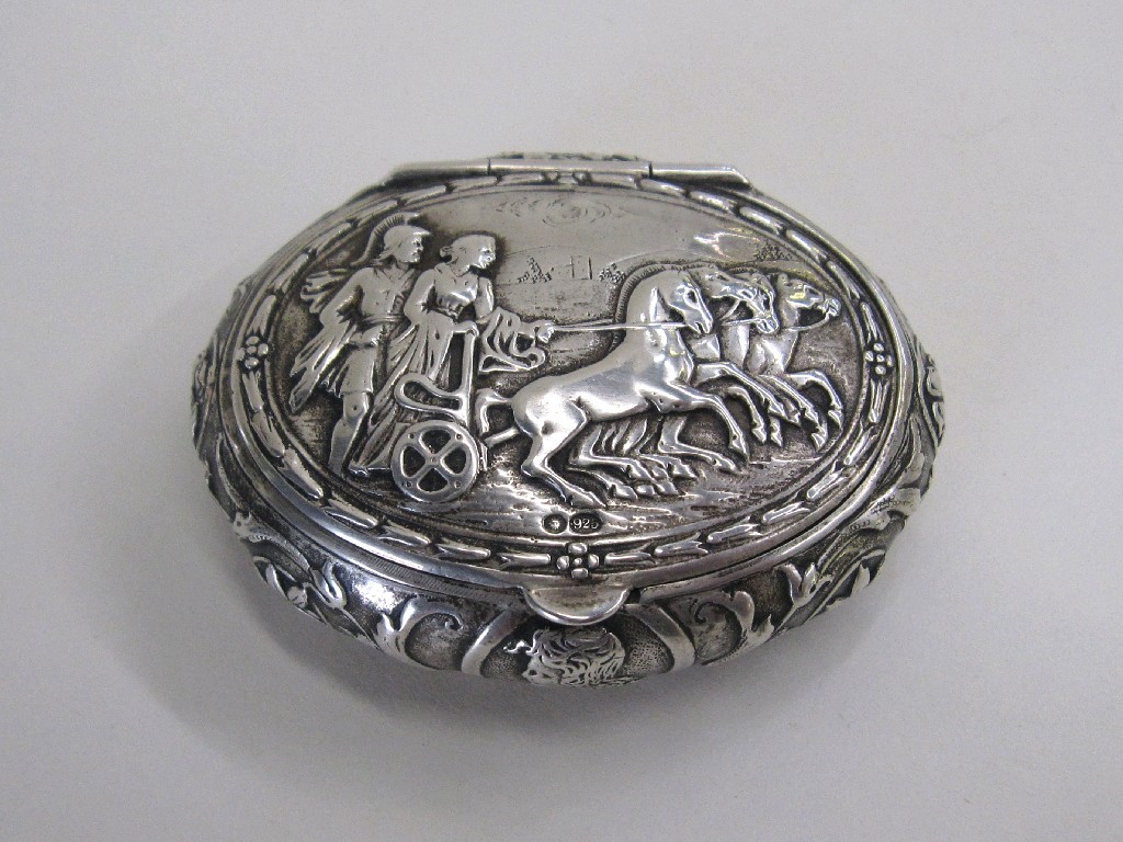 Appraisal: Embossed Russian silver snuff box decorated with male and female