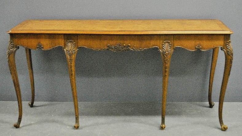 Appraisal: - Louis XVI style finely carved fruitwood three-drawer side server