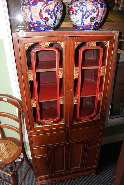 Appraisal: A LATE TH CENTURY CHINESE HARDWOOD CABINET the blue glazed