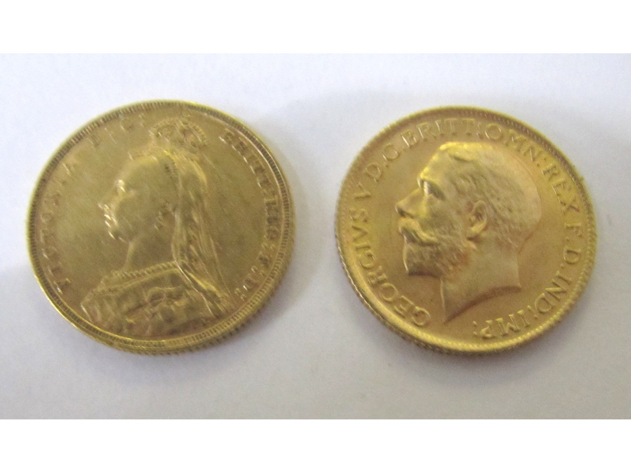 Appraisal: An Queen Victoria gold sovereign very fine and a George