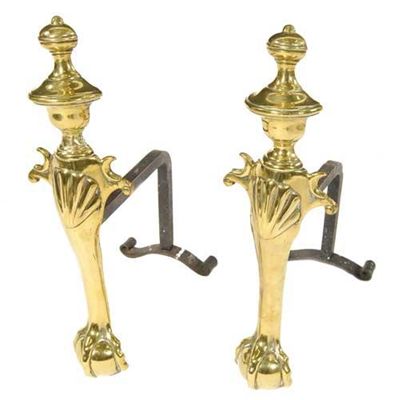 Appraisal: A pair of George II brass andirons in the form