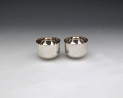 Appraisal: A pair of modern Scottish silver tumbler cups maker's mark