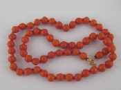 Appraisal: A coral bead necklace the beads measuring approx mm diameter