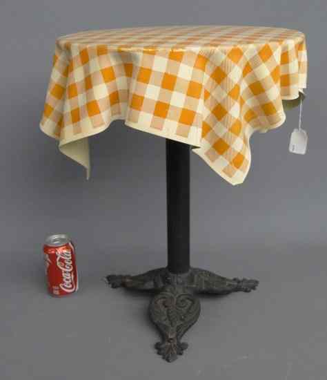 Appraisal: C ' s child's iron table with faux tablecloth top