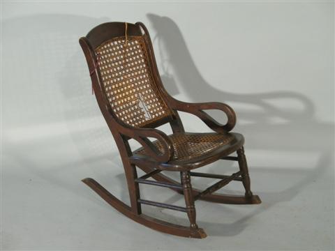 Appraisal: VICTORIAN MAPLE CANE CHILD'S ROCKER h in