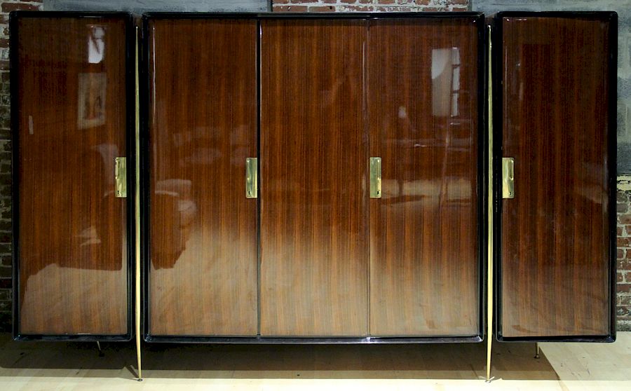 Appraisal: ITALIAN MAHOGANY ARMOIRE BY SILVIO CAVATORTA A large Italian mahogany