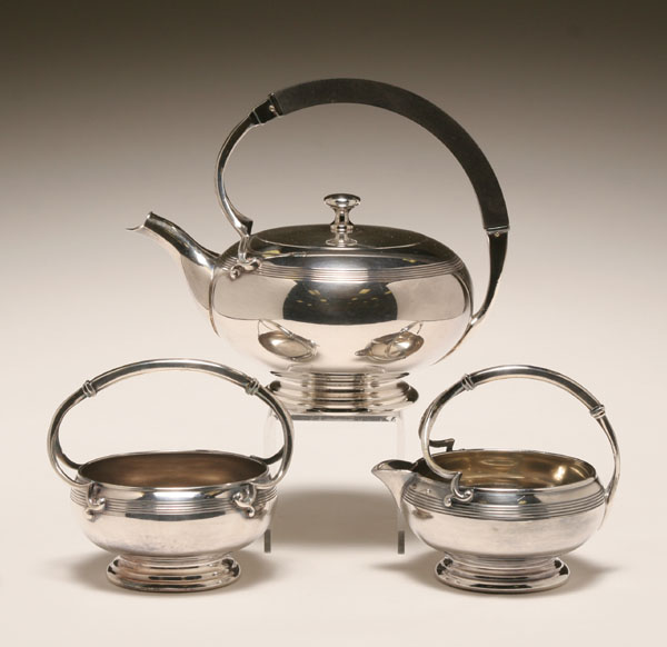 Appraisal: Meriden streamline design silverplate tea set tea pot with wooden