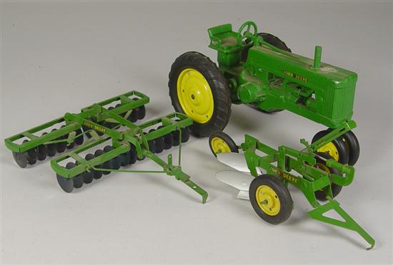 Appraisal: Three John Deere Agricultural Toys Model tractor Circa 's Metal