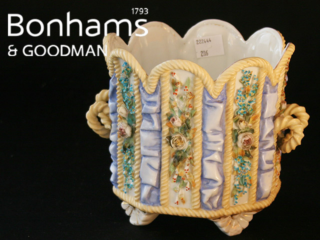 Appraisal: A Continental porcelain twin handled jardini re in the form