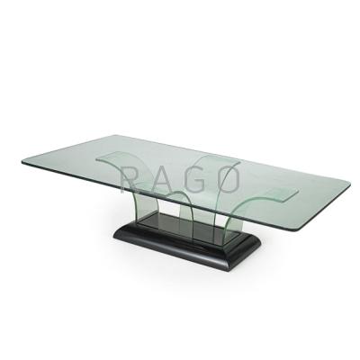 Appraisal: MODERNAGE Sculptural coffee table USA s Bent glass and lacquered