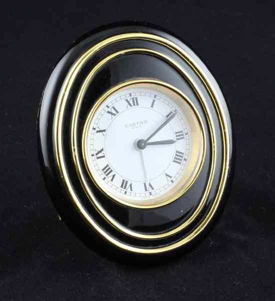 Appraisal: A Cartier gilt metal and black lacquered bedside alarm clock