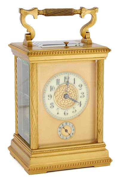 Appraisal: A French brass carriage clock with subsidiary dial in anglaise