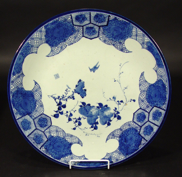 Appraisal: Japanese porcelain charger painted in blue with birds and flowers