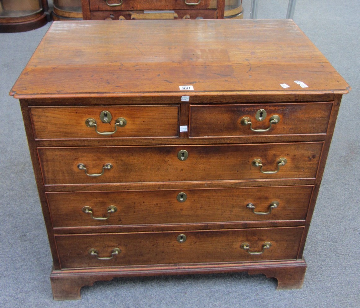 Appraisal: A th century elm chest of two short and three