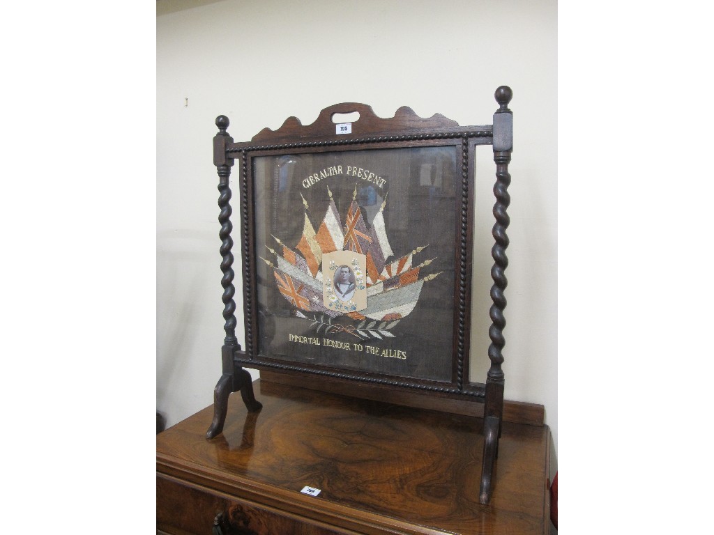 Appraisal: Oak firescreen with embroidered panel