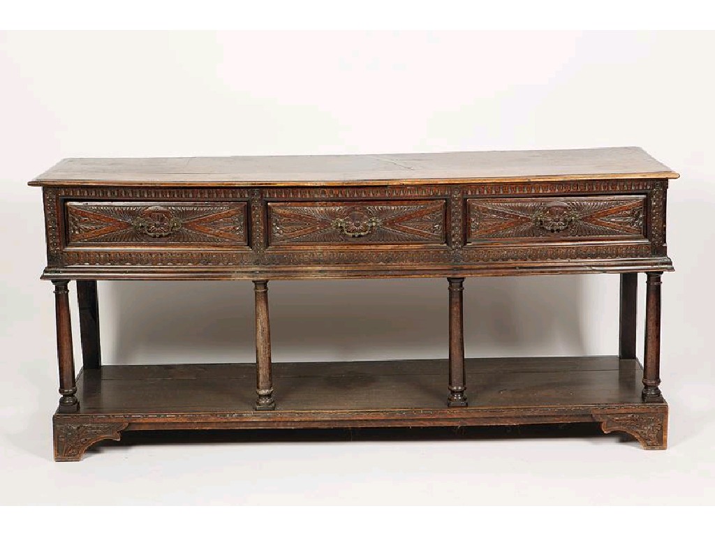 Appraisal: A GEORGE III OAK DRESSER BASE the rectangular top with