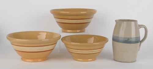 Appraisal: Three yelloware mixing bowls late th c dia together with