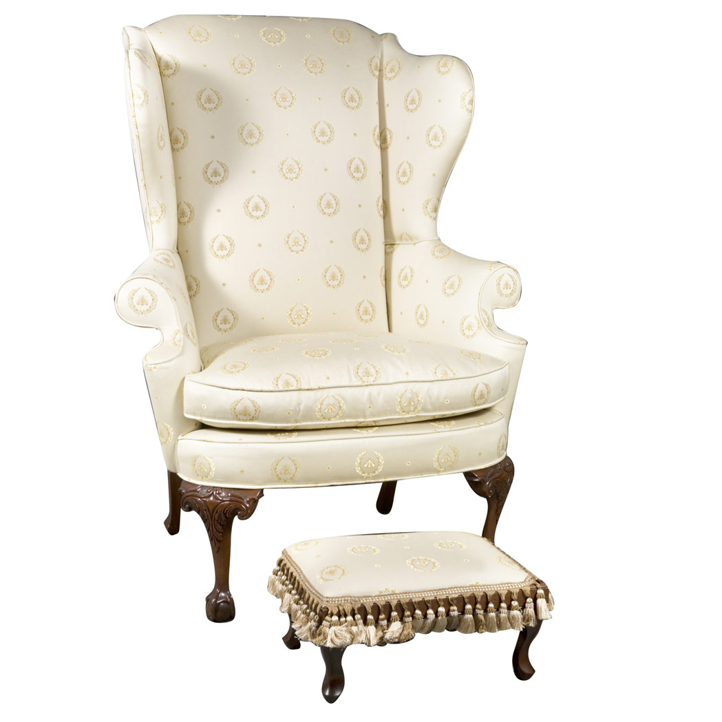 Appraisal: George III Style Mahogany Upholstered Wing Chair and Stool en