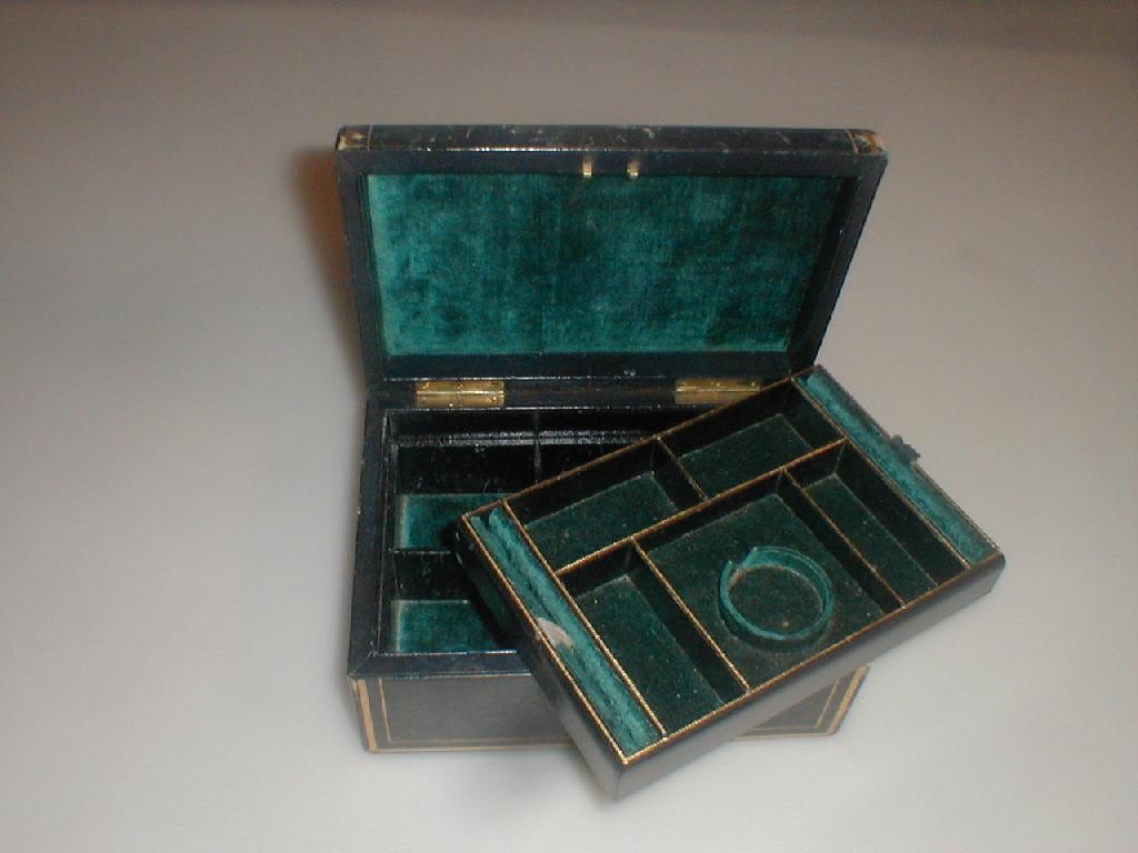 Appraisal: A Victorian leather jewellery box with key