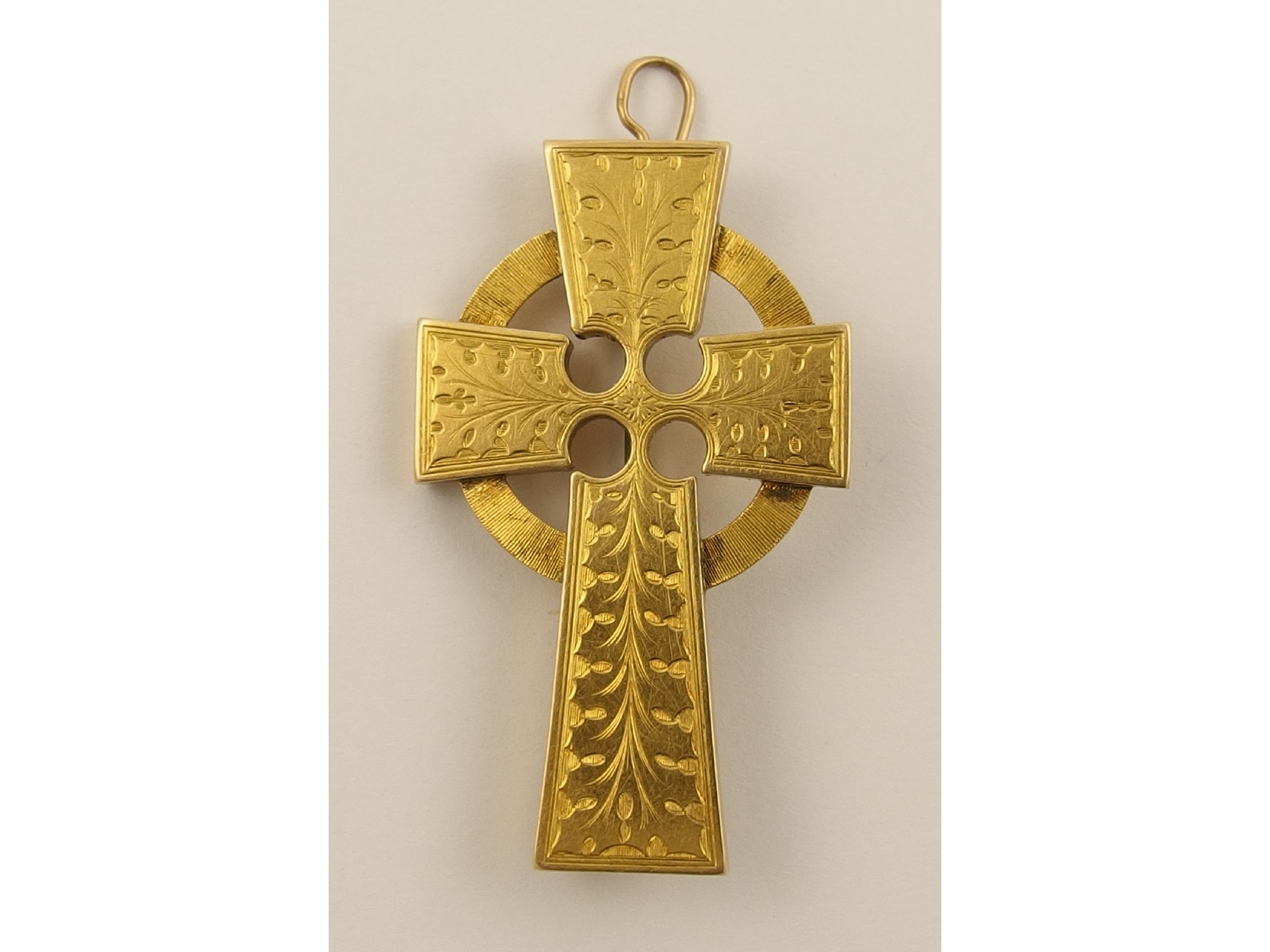 Appraisal: A decorative engraved Celtic crossof hollow handmade construction with proficient