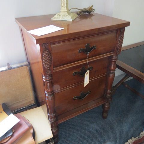 Appraisal: Cherry Nightstand carved pineapple column decor three drawer