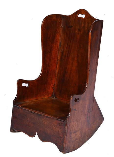 Appraisal: A GEORGE III CHILD'S MAHOGANY COMMODE LAMBING CHAIR with shaped