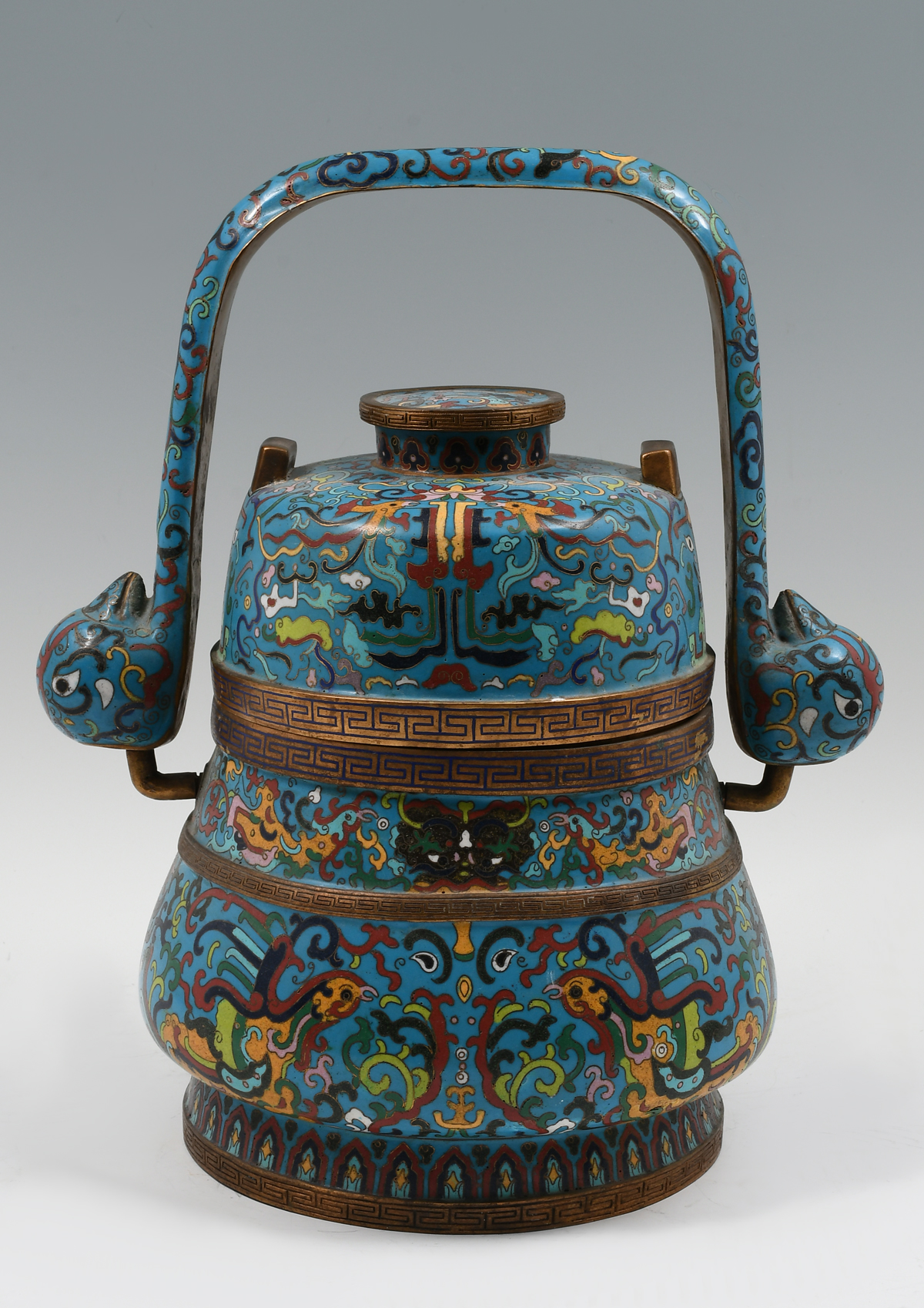 Appraisal: TH-CENTURY CHINESE CLOISONNE HANDLED POT Large Chinese blue ground cloisonne