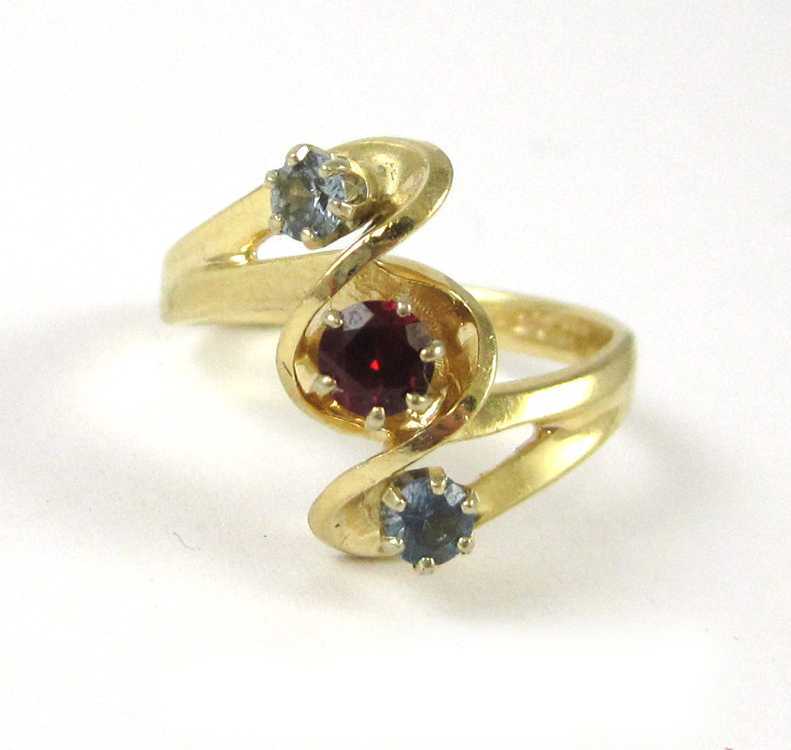 Appraisal: CHATHAM RUBY AND FOURTEEN KARAT GOLD RING set with two