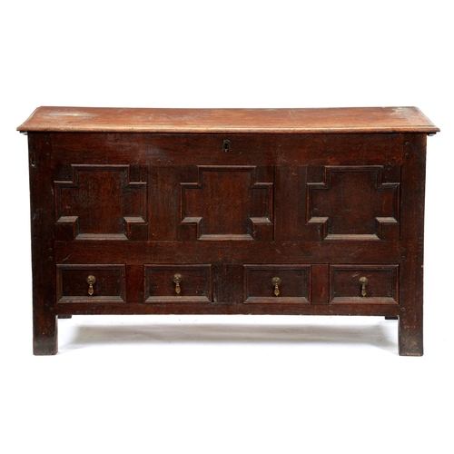 Appraisal: A George III oak mule chest the lid with ovolo