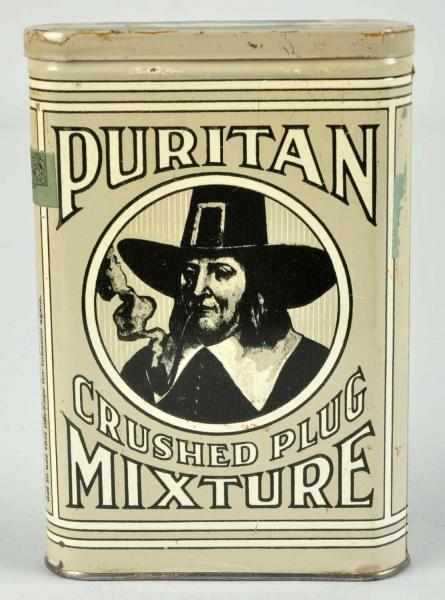 Appraisal: Puritan Pocket Tobacco Tin Description Remnants of original tax stamp