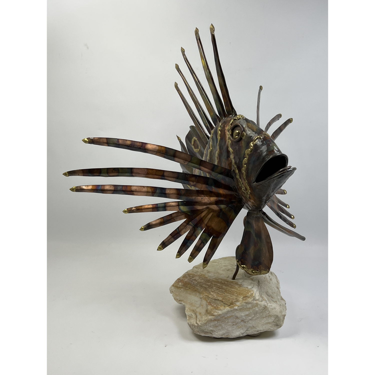 Appraisal: Artist Signed Mixed Metal Lion fish sculpture on stone base