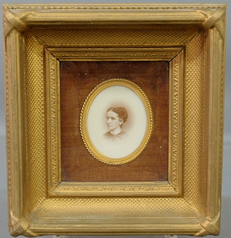 Appraisal: - Oval sepia photo portrait on porcelain of a woman