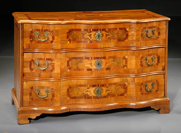 Appraisal: A South German Baroque inlaid walnut chest of drawers second