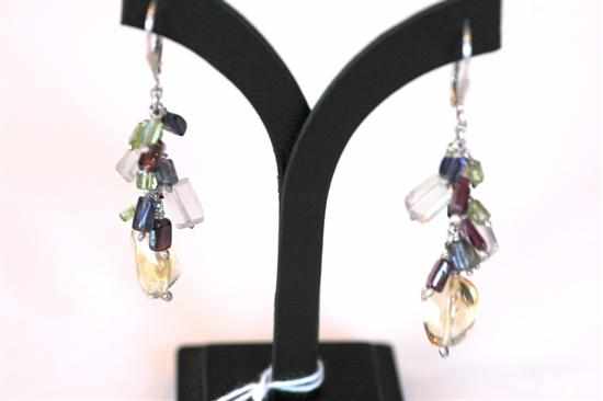 Appraisal: A PAIR OF CITRINE PERIDOT GARNET MOONSTONE AND IOLITE SET