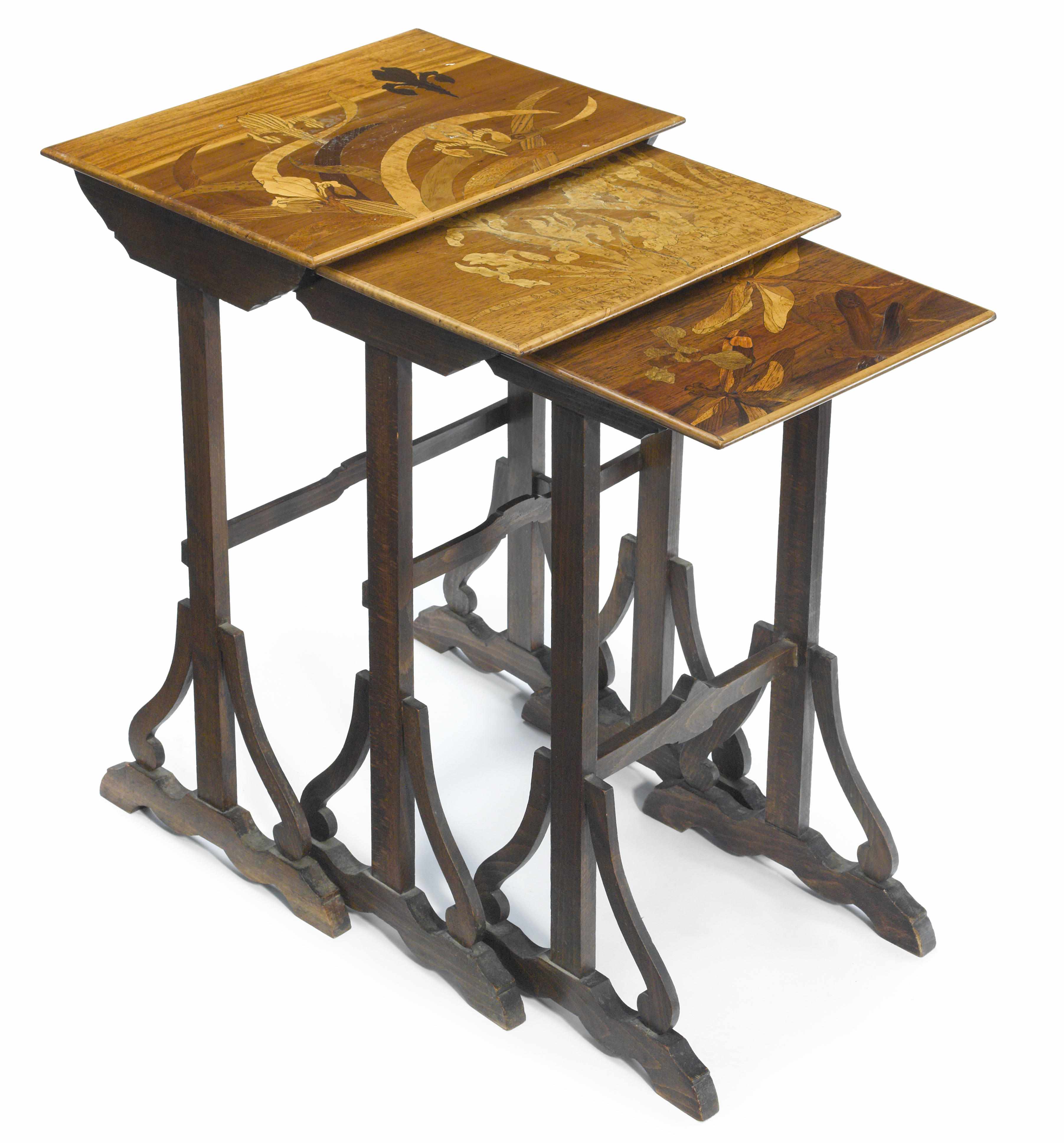 Appraisal: A nest of three Gall marquetry occasional tables circa circa