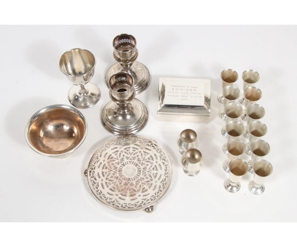 Appraisal: Sterling silver tableware to include weighted candlesticks h x dia