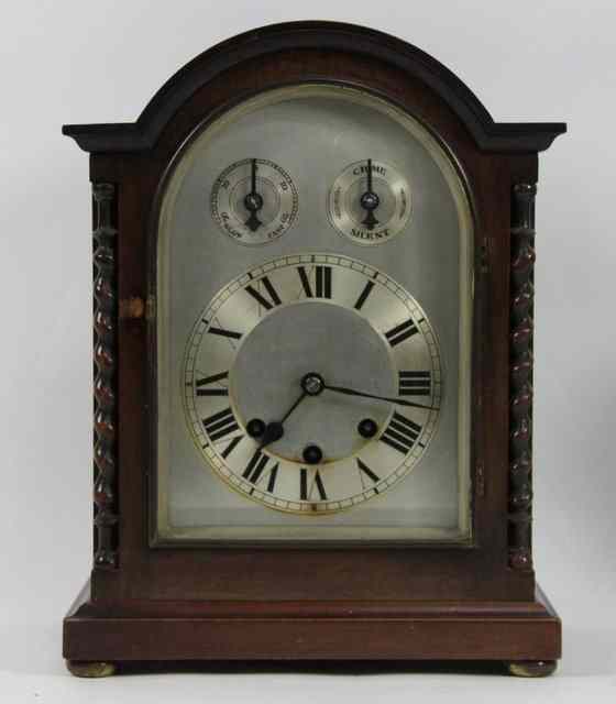 Appraisal: An early th Century stained beech cased mantel clock the