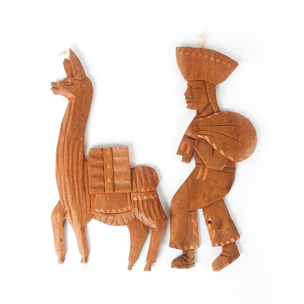 Appraisal: PAIR OF HAND CARVED WOODEN WALL FIGURES MAN AND LLAMA