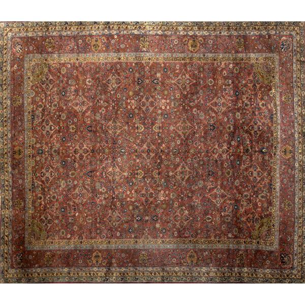 Appraisal: PERSIAN Oriental carpet with rose ground and tri-color banded border