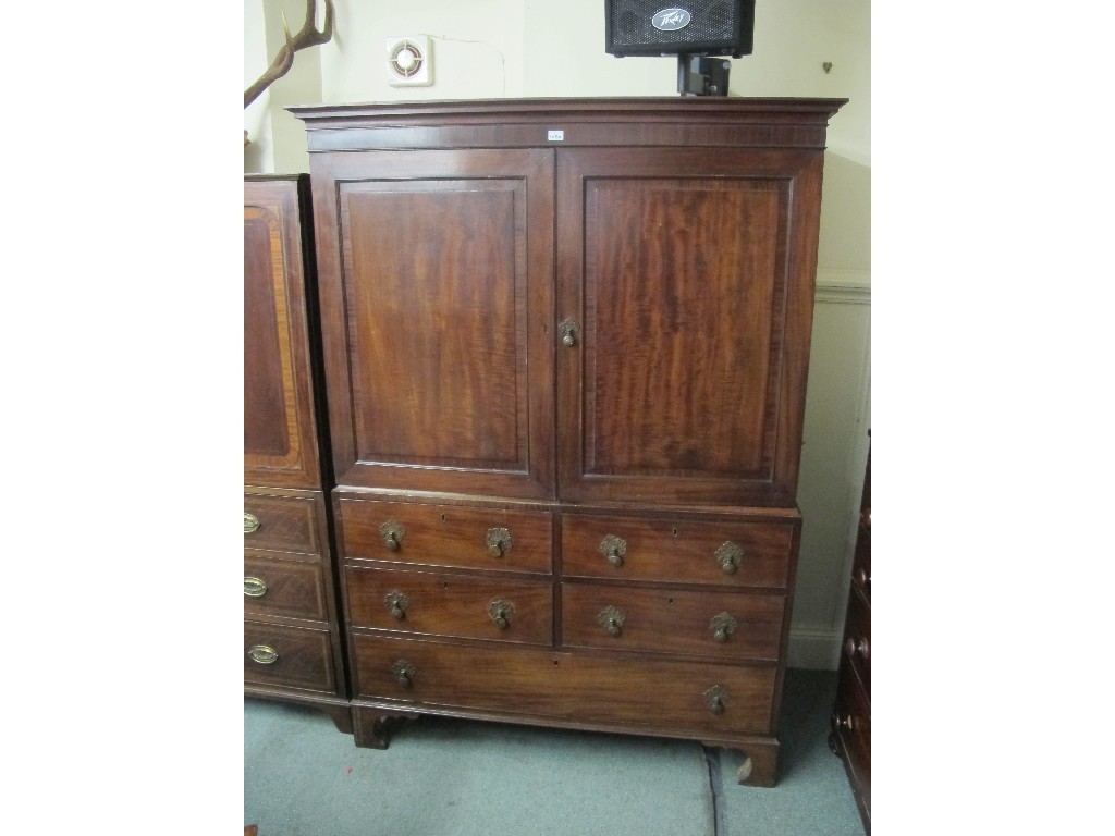 Appraisal: th century mahogany linen press on chest Provenance The Property