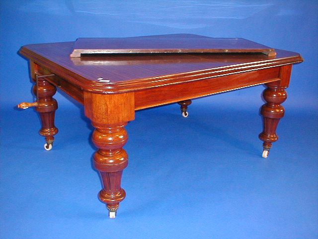 Appraisal: A late Victorian mahogany wind-out dining table with moulded top