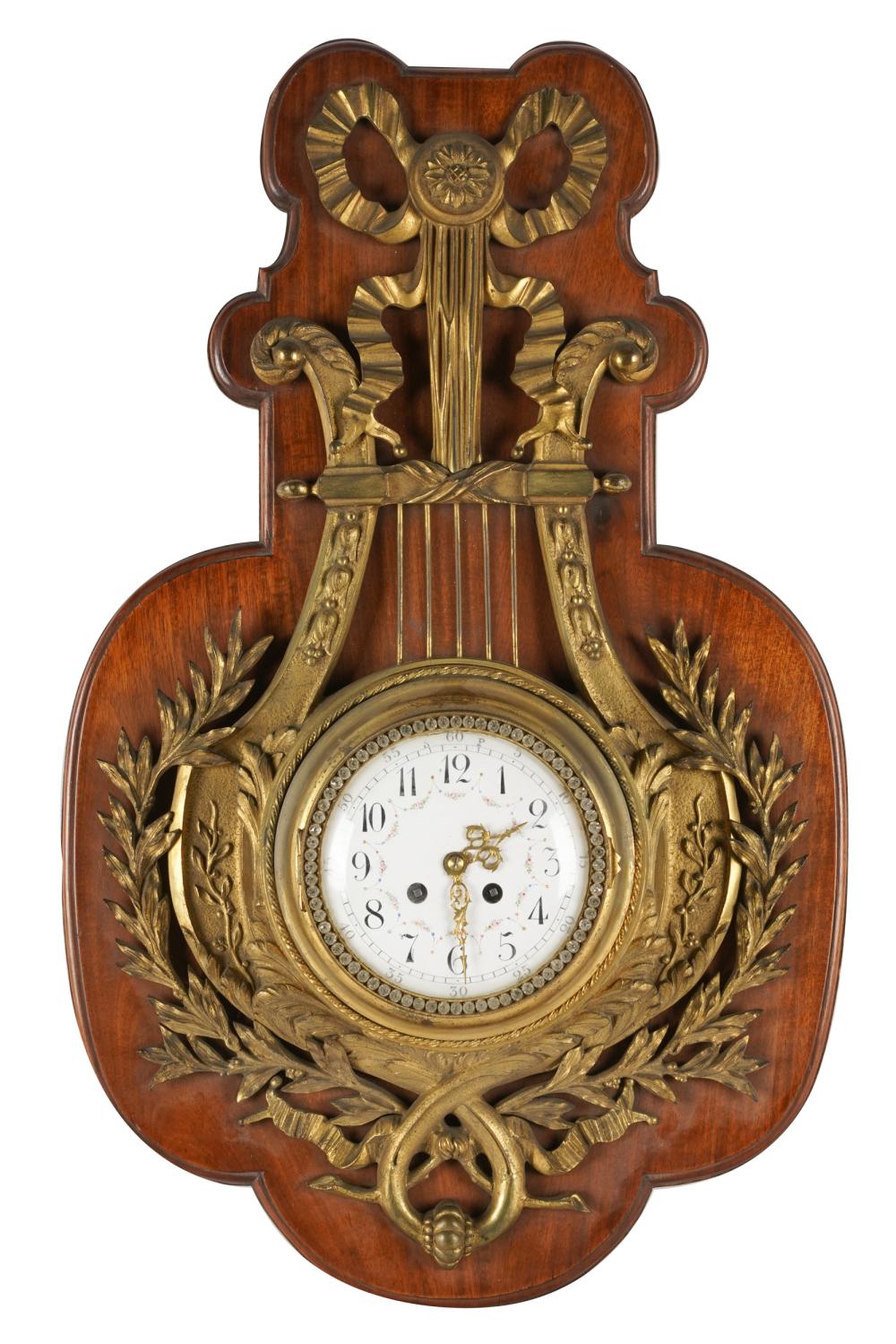 Appraisal: LOUIS XVI-STYLE GILT BRONZE CARTEL CLOCKunsigned mounted to wooden panel